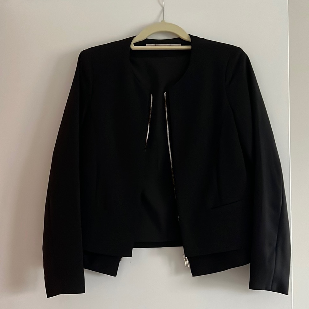 New blazer. Nice details with zipper.